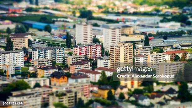 tilt-shift miniature aerial view of new quarter in martigny, switzerland - tilt shift stock pictures, royalty-free photos & images
