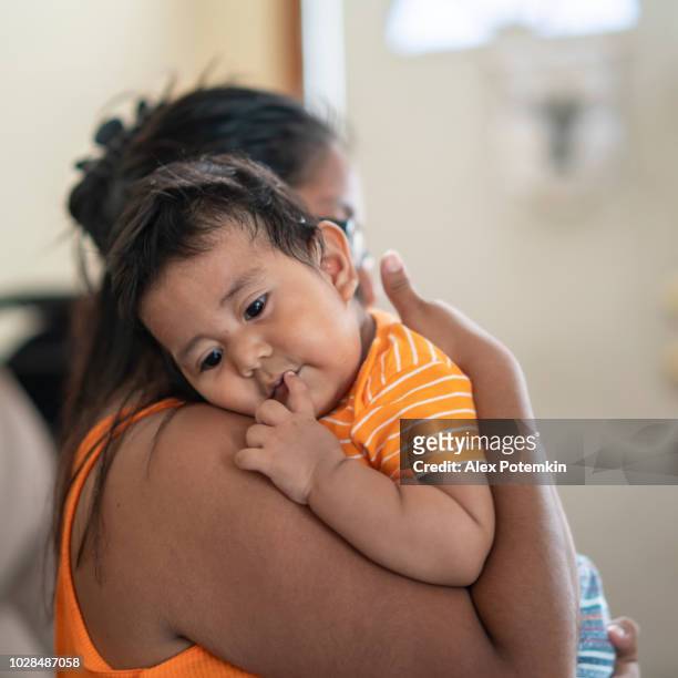 the latino mexican-american mother with son, a little boy - hot mexican girls stock pictures, royalty-free photos & images