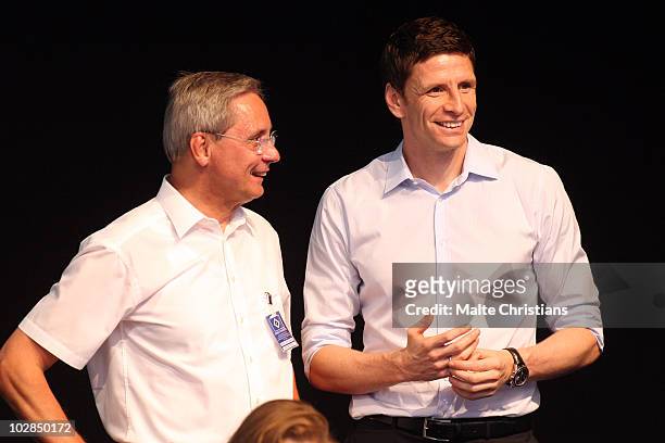 Eckart Westphalen functionary and Bastian Reinhardt director of sports talk before the Hamburger SV general meeting at the Imtech Arena on July 13,...