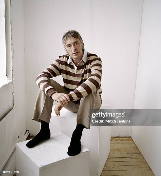 Singer Paul Weller poses for a portrait shoot on October 30, 2003 in London.