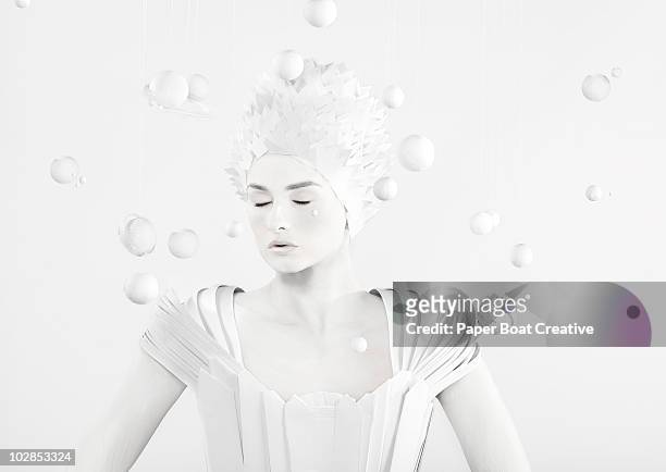 all white woman in the center of planets - body paint foto e immagini stock