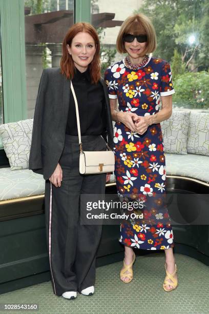 Julianne Moore and Anna Wintour pose backstage during the Tory Burch Spring Summer 2019 Fashion Show at Cooper Hewitt, Smithsonian Design Museum on...