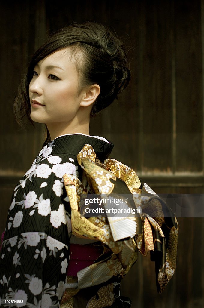 Woman in Kimono looking ahead