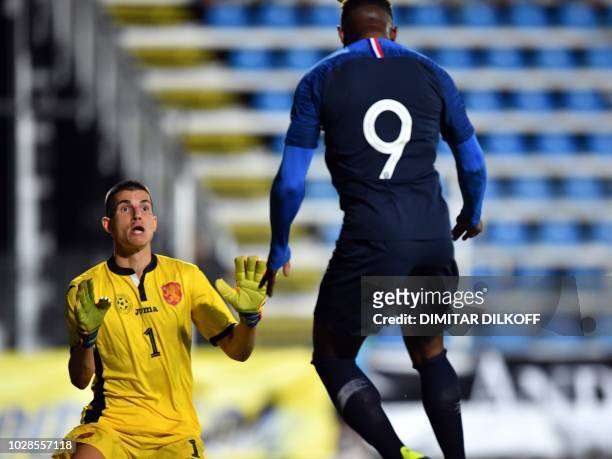 Bulgaria's goalkeeper Daniel Naumov reacts as France's forward Moussa Dembele scores a goal against Bulgaria during the Euro Under-21 Championship...