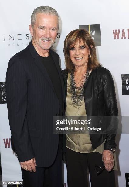 Actor Patrick Duffy and actress Linda Gray arrive for the Premiere Of Cinespots' "Warning Shot" held at The WGA Theater on September 6, 2018 in...