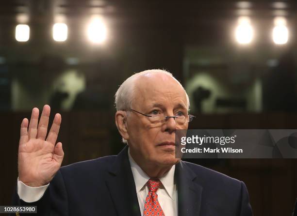 John Dean, former White House counsel to President Nixon, is sworn in during a hearing on the nomination of federal appeals court judge Brett...