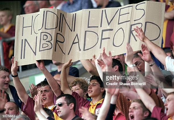 Bradford City fans celebrate avoiding relegation after the FA Carling Premiership match against Liverpool at Valley Parade in Bradford, England....