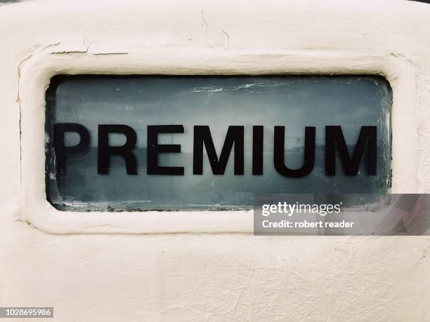 premium sign on old gas pump - premium gasoline stock pictures, royalty-free photos & images