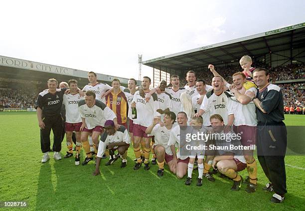 The Bradford City team celebrate avoiding relegation after the FA Carling Premiership match against Liverpool at Valley Parade in Bradford, England....