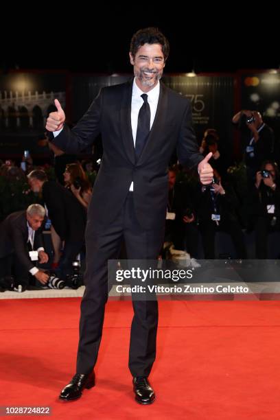 Alessandro Gassmann walks the red carpet ahead of the "Una Storia Senza Nome" screening during the 75th Venice Film Festival at Sala Grande on...