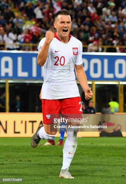 Piotr Zielinski of Poland celebrates after scoring the opening goal during the UEFA Nations League A group three match between Italy and Poland at...