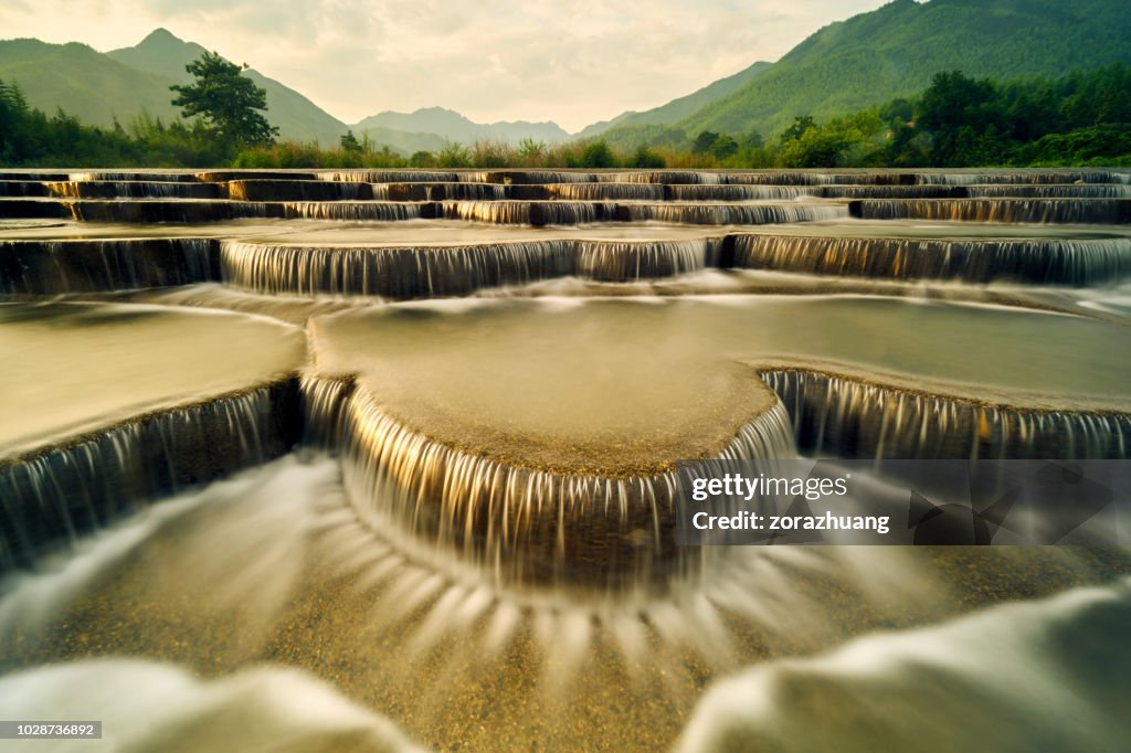 Round Step Waterfall Stepped Waterfall Group At Sunset High-Res Stock Photo - Getty Images