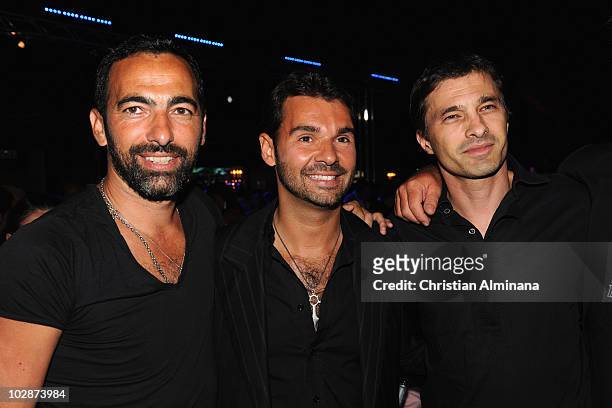 Youri Djorkaeff , Byblos Hotel owner Antoine Chevanne and Olivier Martinez attend the Byblos Summer Party at Byblos Hotel on July 13, 2010 in...