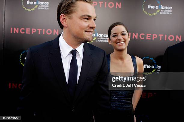 Actors Leonardo DiCaprio and Marion Cotillard arrive at the "Inception" Los Angeles Premiere at Grauman's Chinese Theatre on July 13, 2010 in...