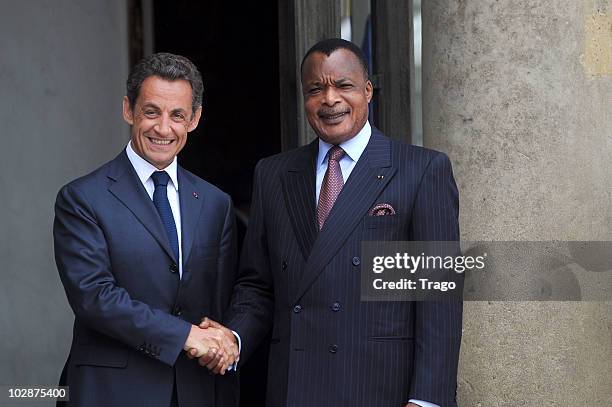 French President Nicolas Sarkozy welcomes Congolese President Denis Sassou Nguesso at the Elysee Palace on July 13, 2010 in Paris, France. Fifty...