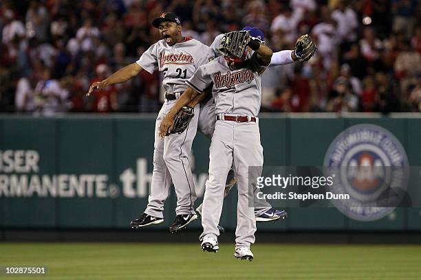 National League All-Star Michael Bourn of the Houston Astros, National League All-Star Marlon Byrd of the Chicago Cubs and National League All-Star...