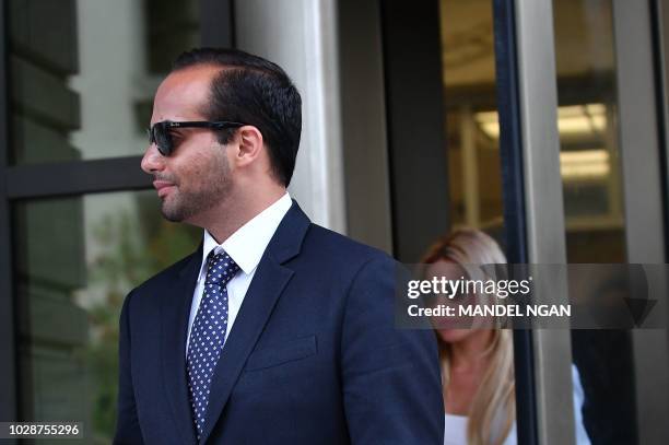 Foreign policy advisor to US President Donald Trump's election campaign, George Papadopoulos and his wife Simona Mangiante Papadopoulos leave the US...