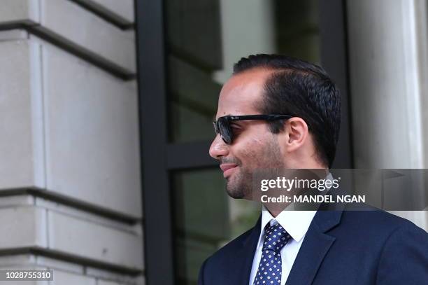 Foreign policy advisor to US President Donald Trump's election campaign, George Papadopoulos leaves the US District Courts after his sentencing in...