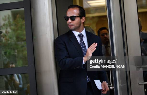 Foreign policy advisor to US President Donald Trump's election campaign, George Papadopoulos leaves the US District Courts after his sentencing in...