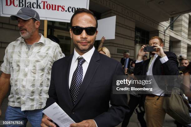 George Papadopoulos, former campaign adviser for U.S. President Donald Trump, walks out of federal court in Washington, D.C., U.S., on Friday, Sept....