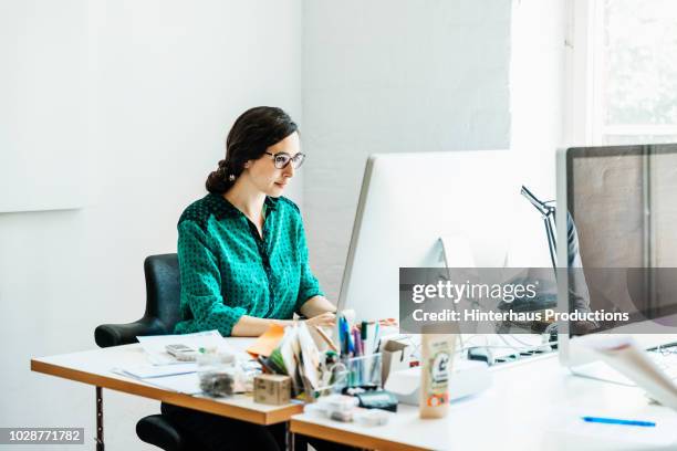 startup business manager working at computer - small office stock pictures, royalty-free photos & images