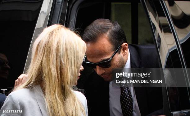 Former Trump campaign advisor George Papadopoulos and his wife Simona Mangiante Papadopoulos arrive at US District Court for his sentencing in...