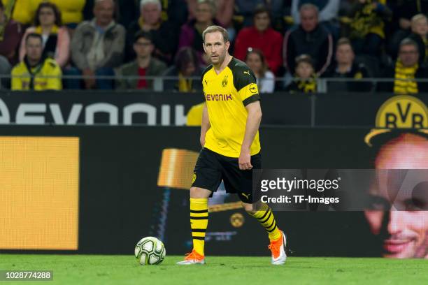 Florian Kringe of Borussia Dortmund Allstars controls the ball during the Roman Weidenfeller Farewell Match between BVB Allstars and Roman and...