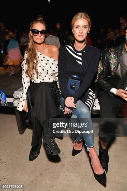 Paris Hilton and Nicky Hilton Rothschild attend the Monse front row during New York Fashion Week: The Shows at SIR Stage 37 on September 7, 2018 in...