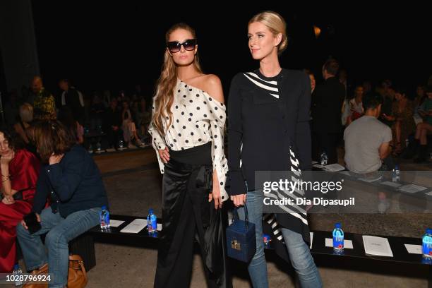 Paris Hilton and Nicky Hilton Rothschild attend the Monse front row during New York Fashion Week: The Shows at SIR Stage 37 on September 7, 2018 in...