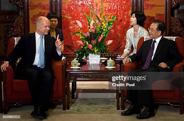 British Foreign Secretary William Hague talks with Chinese Premier Wen Jiabao during their meeting at Zhongnanhai on July 14, 2010 in Beijing, China....