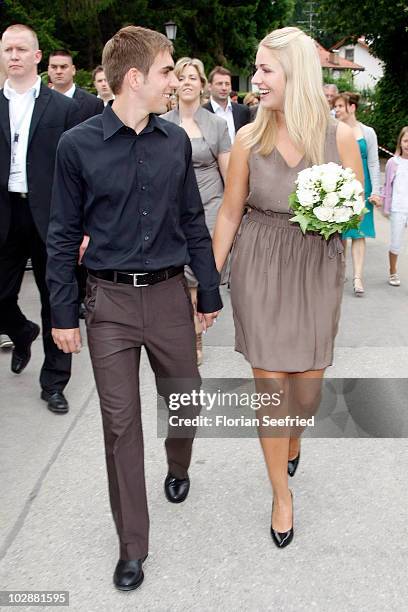 Bayern football player Philipp Lahm and Claudia Schattenberg arrive for their civil wedding at the city hall of Aying on July 14, 2010 in Aying,...