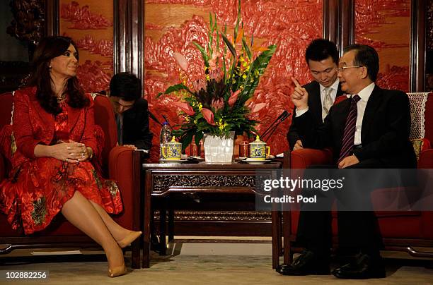 Argentine President Cristina Kirchner listens to Chinese Premier Wen Jiabao during a meeting at the Zhongnanhai leadership compound July 14, 2010 in...