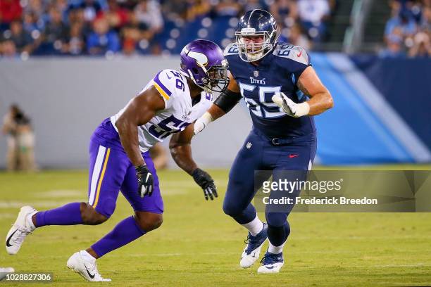 Tyler Marz of the Tennessee Titans plays against Antwione Williams of the Minnesota Vikings during a preseason game at Nissan Stadium on August 30,...