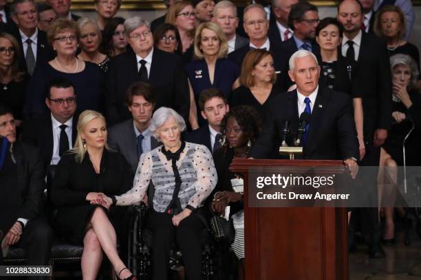 Vice President Mike Pence delivers remarks as Roberta McCain , the mother of the late US Senator John McCain, and granddaughter Meghan McCain attend...