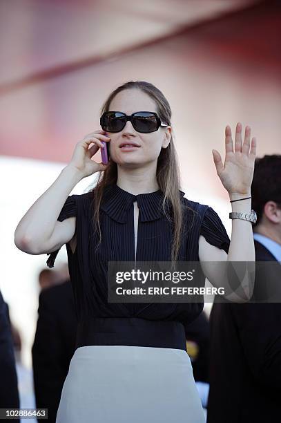 Consuelo Remmert, half-sister of French First Lady Carla Bruni-Sarkozy, waits to attend the annual Bastille Day military parade in Paris July 14,...