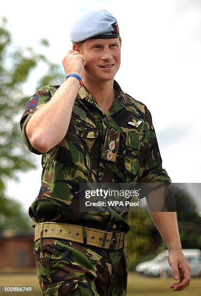 Prince Harry visits RAF Honington on July 14, 2010 in Suffolk, easten England. During his visit, Prince Harry was shown Fuchs armoured vehicles that...