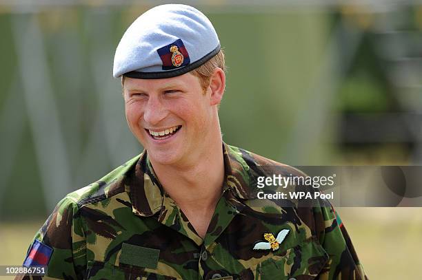 Prince Harry visits RAF Honington on July 14, 2010 in Suffolk, easten England. During his visit, Prince Harry was shown Fuchs armoured vehicles that...