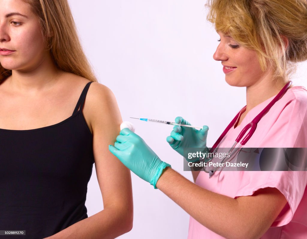 Teusing Injection Shot Doctor Giving Tetanus Injection Vaccination High-Res Stock Photo ...