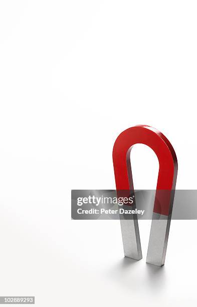 magnet on white background with copy space - magnet stock-fotos und bilder