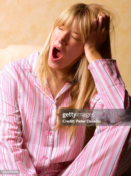 28 year old woman with sleeping problems - pyjamas stock pictures, royalty-free photos & images