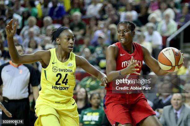 Ariel Atkins of the Washington Mystics works against Jewell Loyd of the Seattle Storm in the third quarter during game one of the WNBA Finals at...
