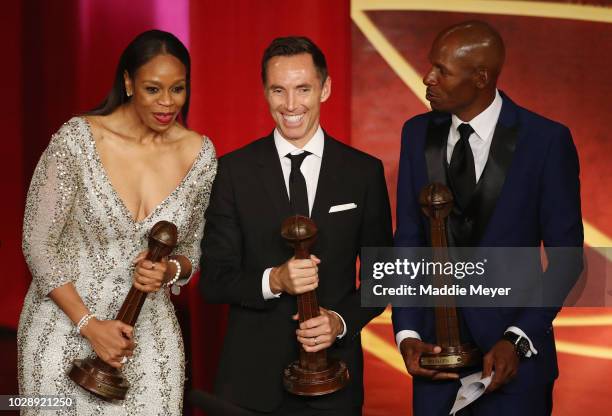 Naismith Memorial Basketball Hall of Fame Class of 2018 enshrinees Tina Thompson, Steve Nash, and Ray Allen stand onstage during the 2018 Basketball...