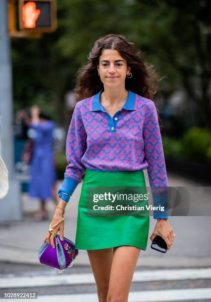 Leandra Medine wearing purple top, green mini skirt is seen outside Tory Burch during New York Fashion Week Spring/Summer 2019 on September 7, 2018...