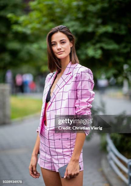 Anja Leuenberger wearing pink checked blazer is seen outside Cushnie et Ochs during New York Fashion Week Spring/Summer 2019 on September 7, 2018 in...