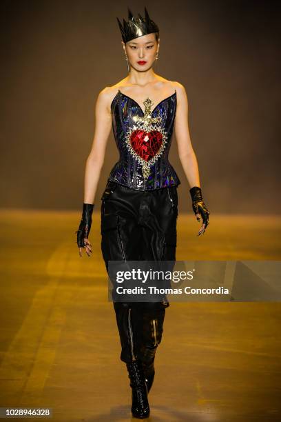 Model walks the runway during Disney Villains x The Blonds fashion show at Gallery I at Spring Studios on September 7, 2018 in New York City.