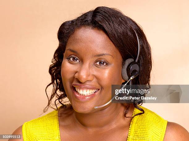 smiling overweight call centre lady - helpdesk portrait stock pictures, royalty-free photos & images