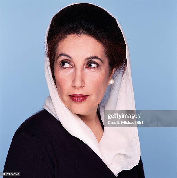 Benazir Bhutto poses for a portrait shoot in London.