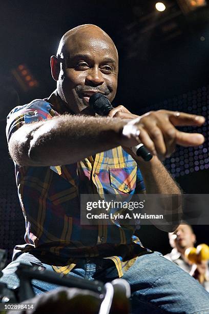 Tony Lindsay performs with Carlos Santana at the First Midwest Bank Amphitheatre on July 9, 2010 in Tinley Park, Illinois.