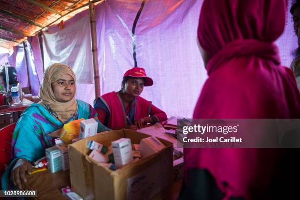 providing medicine to rohingya refugees in bangladesh - rohingya refugee crisis stock pictures, royalty-free photos & images