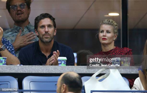 New York Rangers goaltender Henrik Lundqvist of Sweden and his wife Therese Andersson attend the men's semifinals on day 12 of the 2018 tennis US...